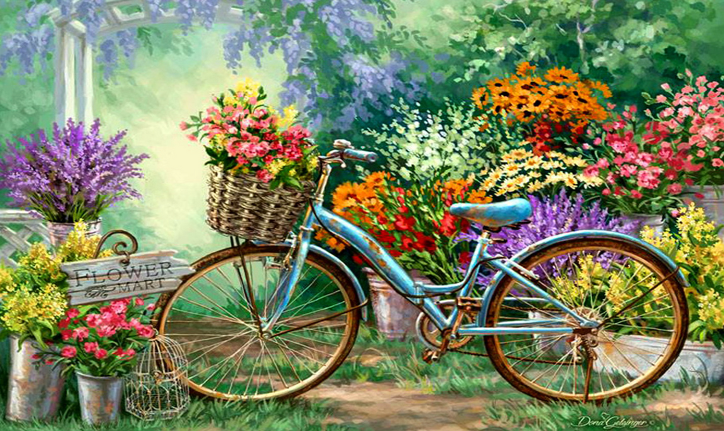 Blå cykel på blomsteräng