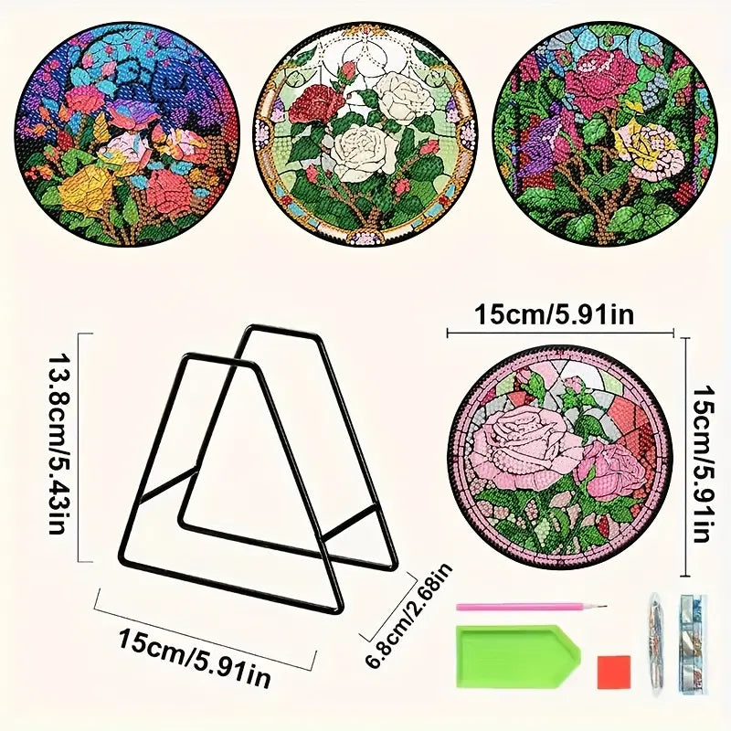 Oversigt over indhold i æske - 4 stk. diamond paint bordskånere med forskellige farverige roser, holder, perler, pen, bakke og voks.