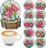 Diamond painting bordskånersæt med 10 brikker med juleblomster.