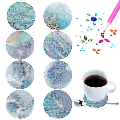 Diamond painting bordskånere med abstrakt mønster i blålige nuancer. 