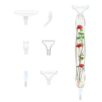 Gennemsigtig pen med tørret grøn og rød blomst i. Benyttes til diamond painting. Udskiftelige tipper.