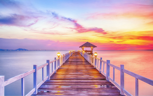 Båtbrygga vid soluppgång/solnedgång