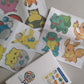 12 forskellige Diamond paint klistermærker med Pokemons.
Blandt andet Pikachu, Bulbasaur og pokeball.